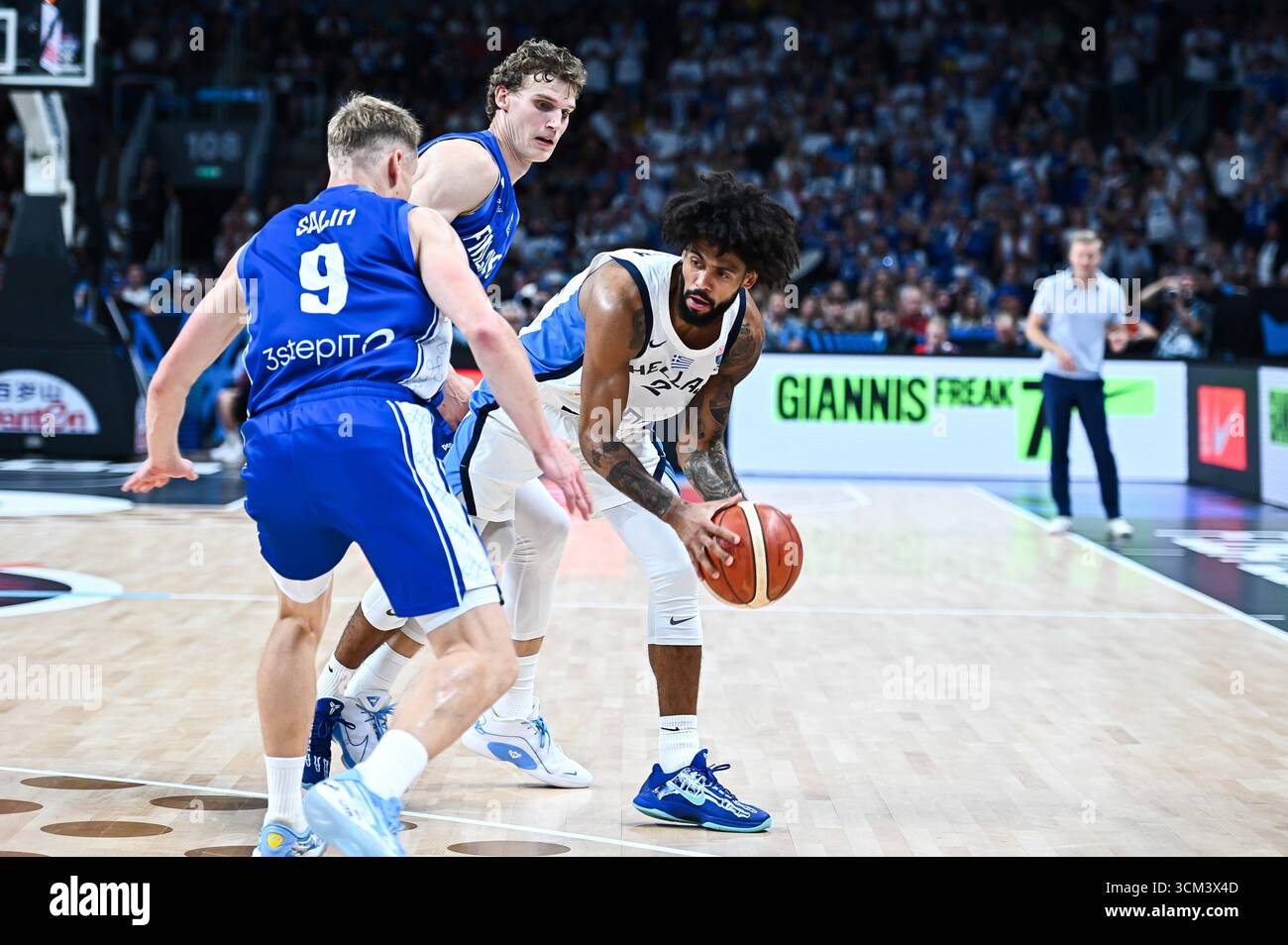 2 Tyler Dorsey of Greece competes with 23 Lauri Markkanen and 9 Sasu ...