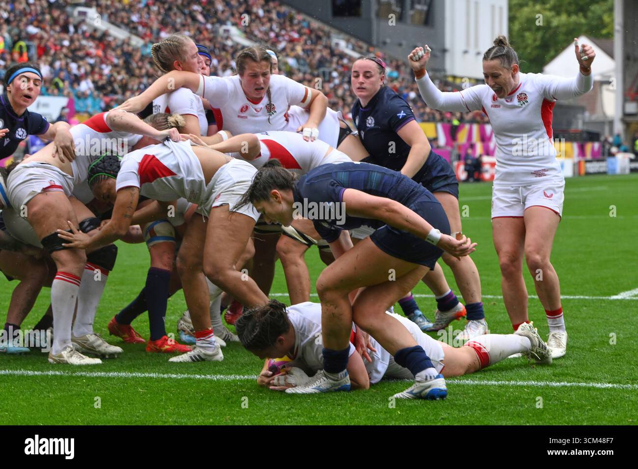 England's Amy Cokayne scores a try during the Women's Rugby World Cup ...