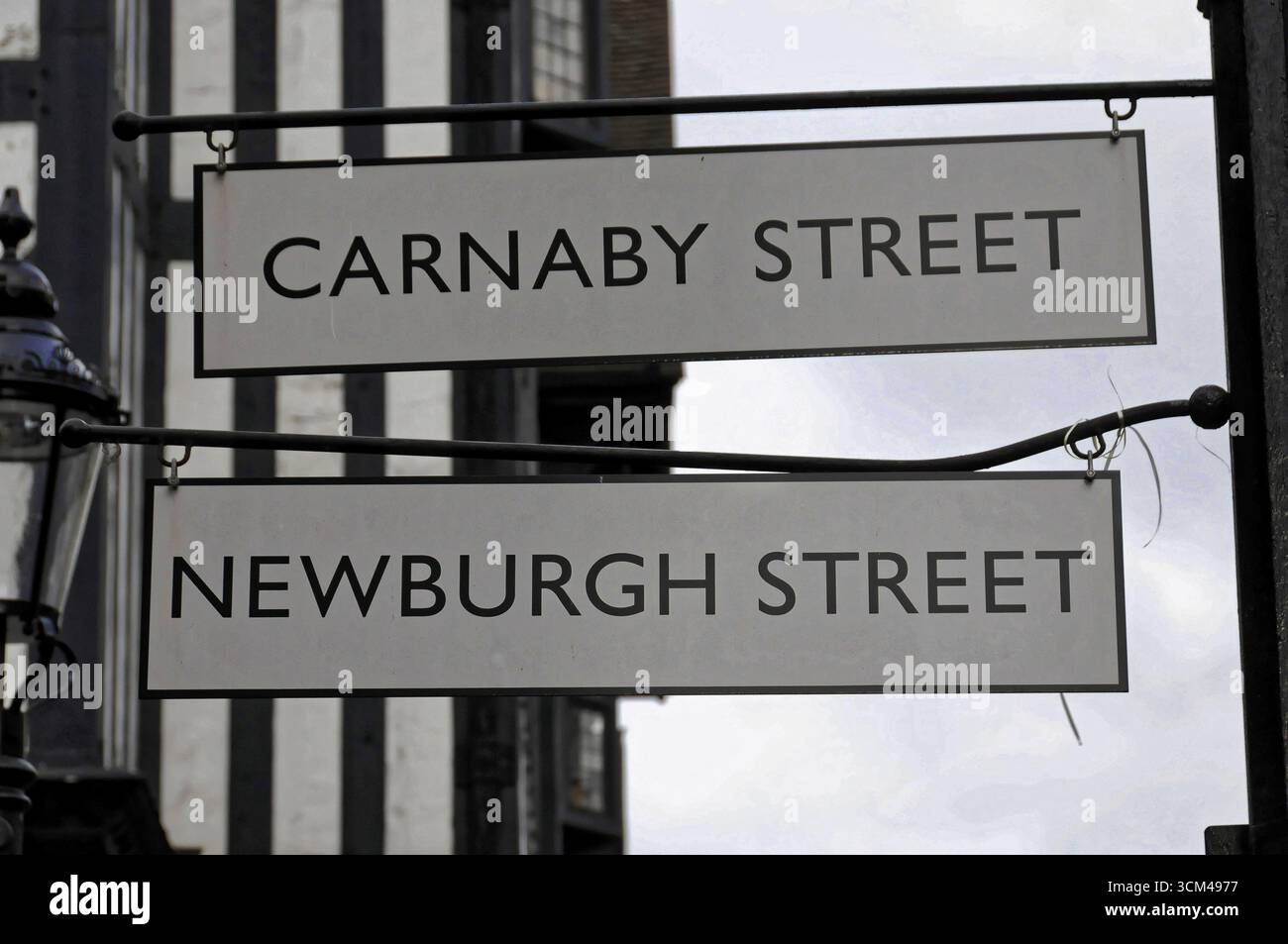 London, England, Great Britain, Europe, Minimalist street signs for Carnaby and Newburgh Street Stock Photo