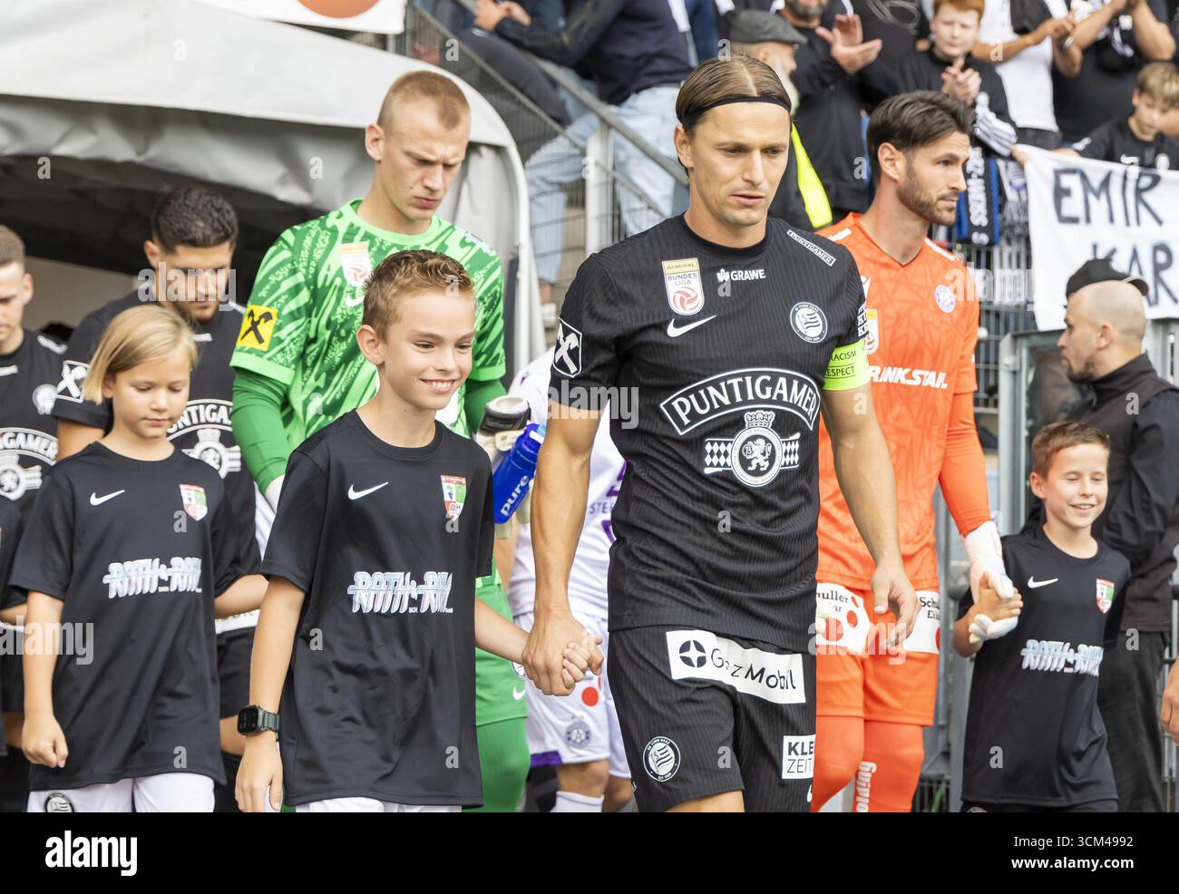 Sturm Graz players hug Hierländer stadium What's Next for Hierländer and Sturm?