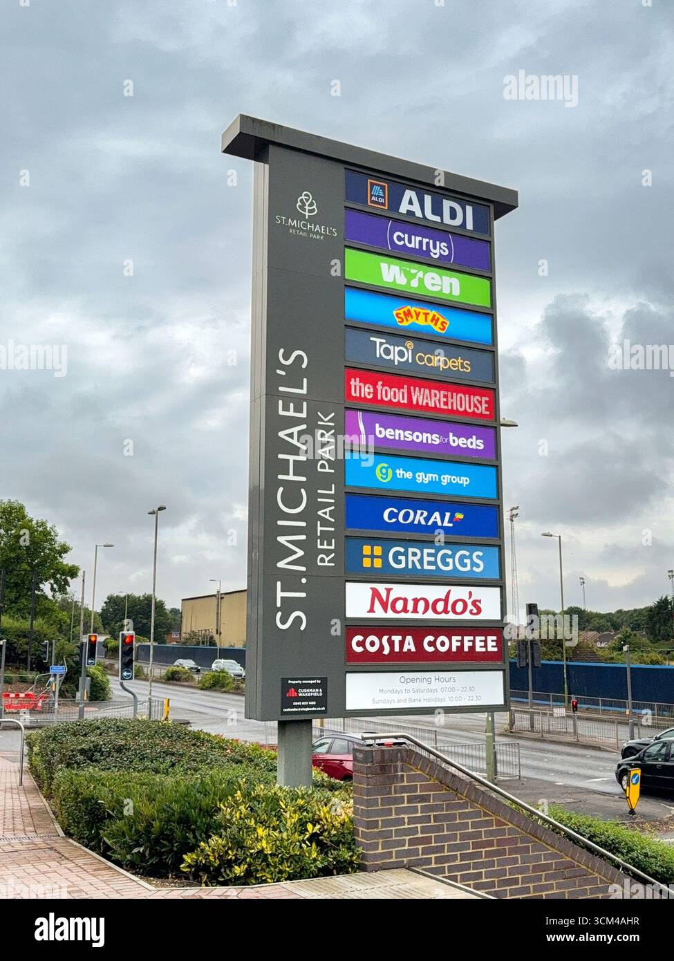 Basingstoke, Hampshire, England, UK - 19 July 2025: Large sign outside St Michael's retail park in Basingstoke showing a list of brand name companies - Smartphone Captured Stock Image