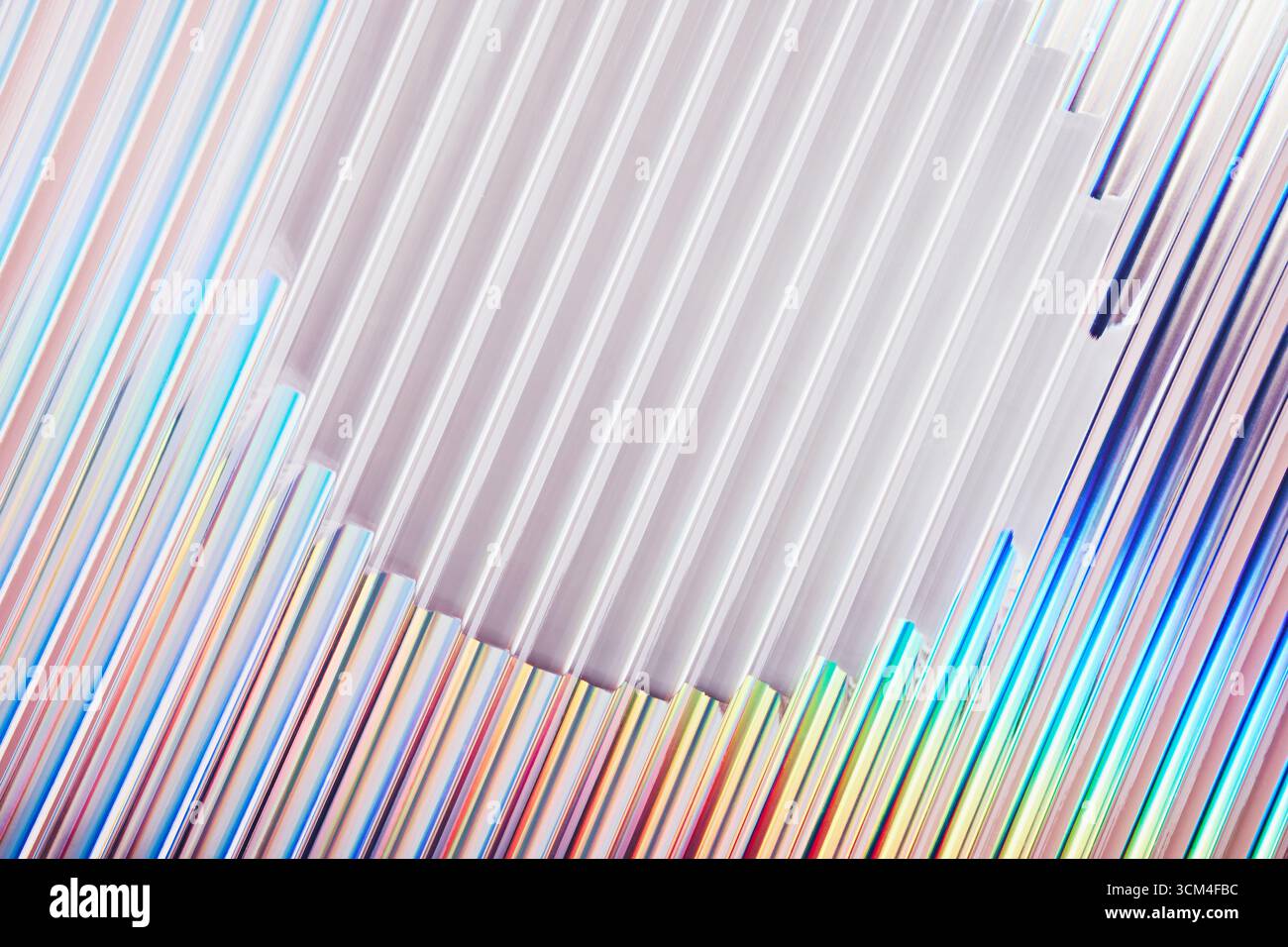 Iridescent gradient ribbed glass background with round frame close-up Stock Photo