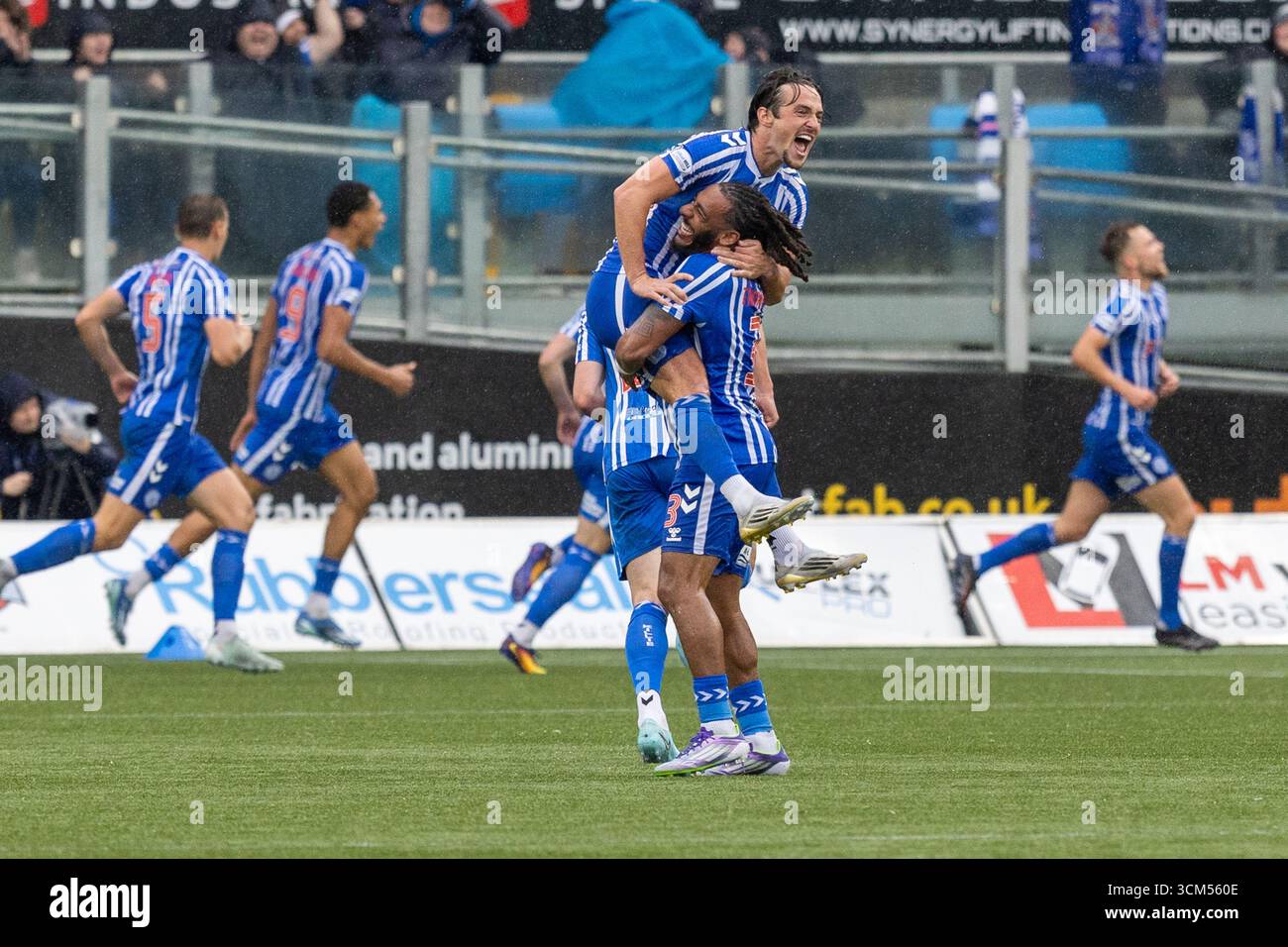 Kilmarnock, UK. 14 September 2025. Kilmarnock, UK. Kilmarnock FC played Celtic FC at Rugby Park, Kilmarnock, Ayrshire,  Scotland in a William Hill Premiership game. The final score was Kilmarnock 1 -2 Celtic. Kilmarnock players celebrate after scoring Kilmarnock's goal in 84 mins.  Dominic Thompson )K3) and James Brown (K15) celebrate in the foreground. Credit: Findlay/ Alamy Live News Stock Photo