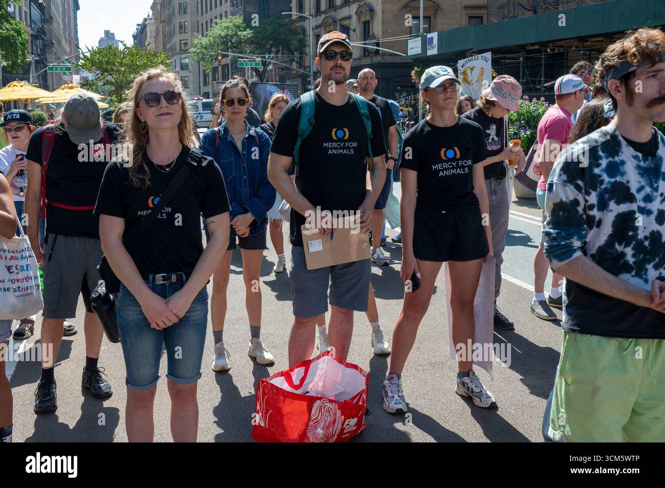 Animal rights protesters wear Marcy For Animals shirts at the Animal ...