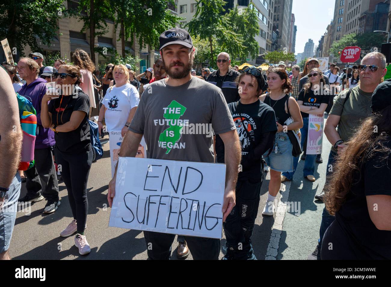 Animal rights protester holds a placard at the Animal Rights March NYC ...