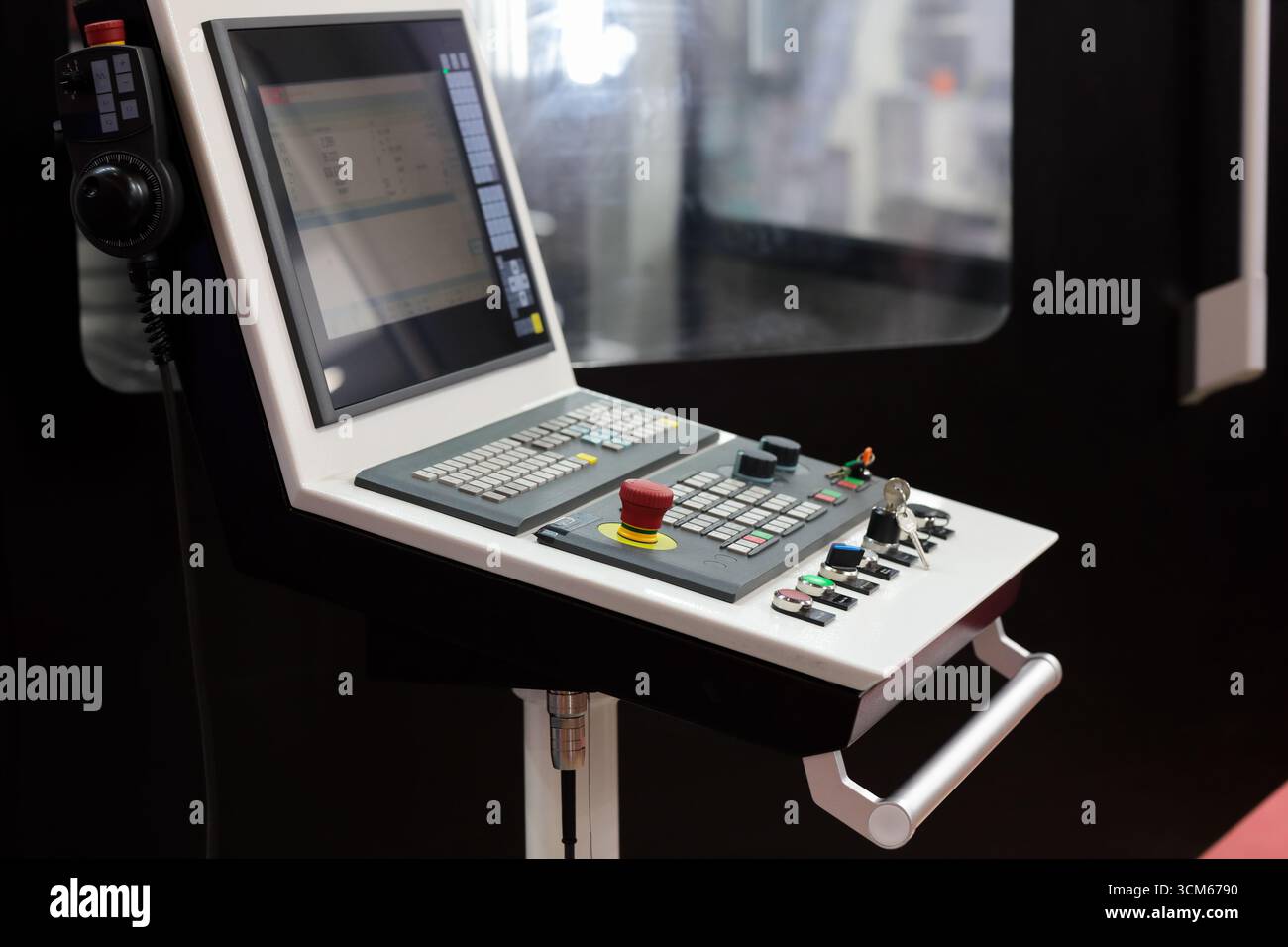 Control console of manufacturing CNC machine close up. Selective focus. Stock Photo