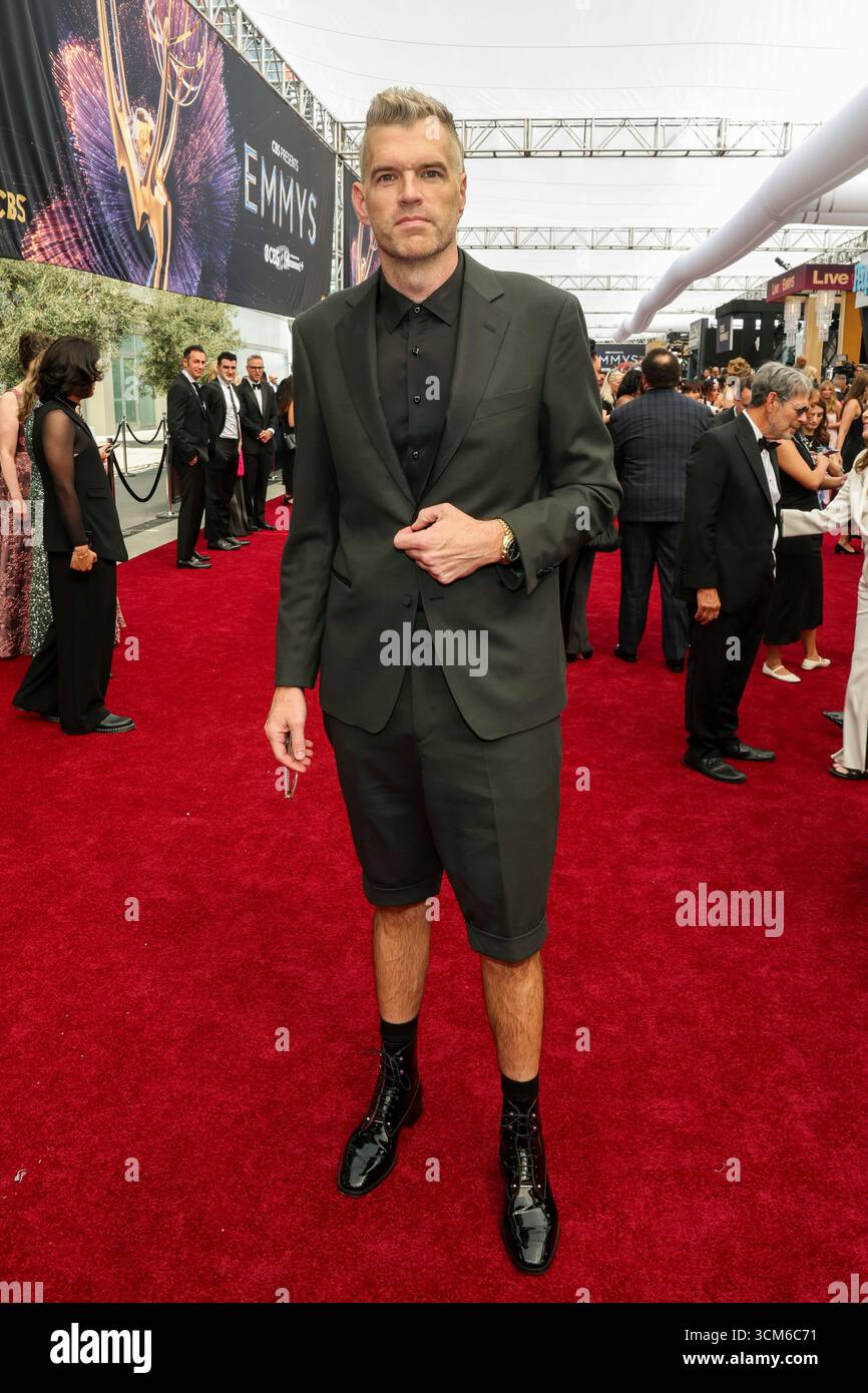 Timothy Simons walks the red carpet at the 77th Emmy Awards on Sunday ...