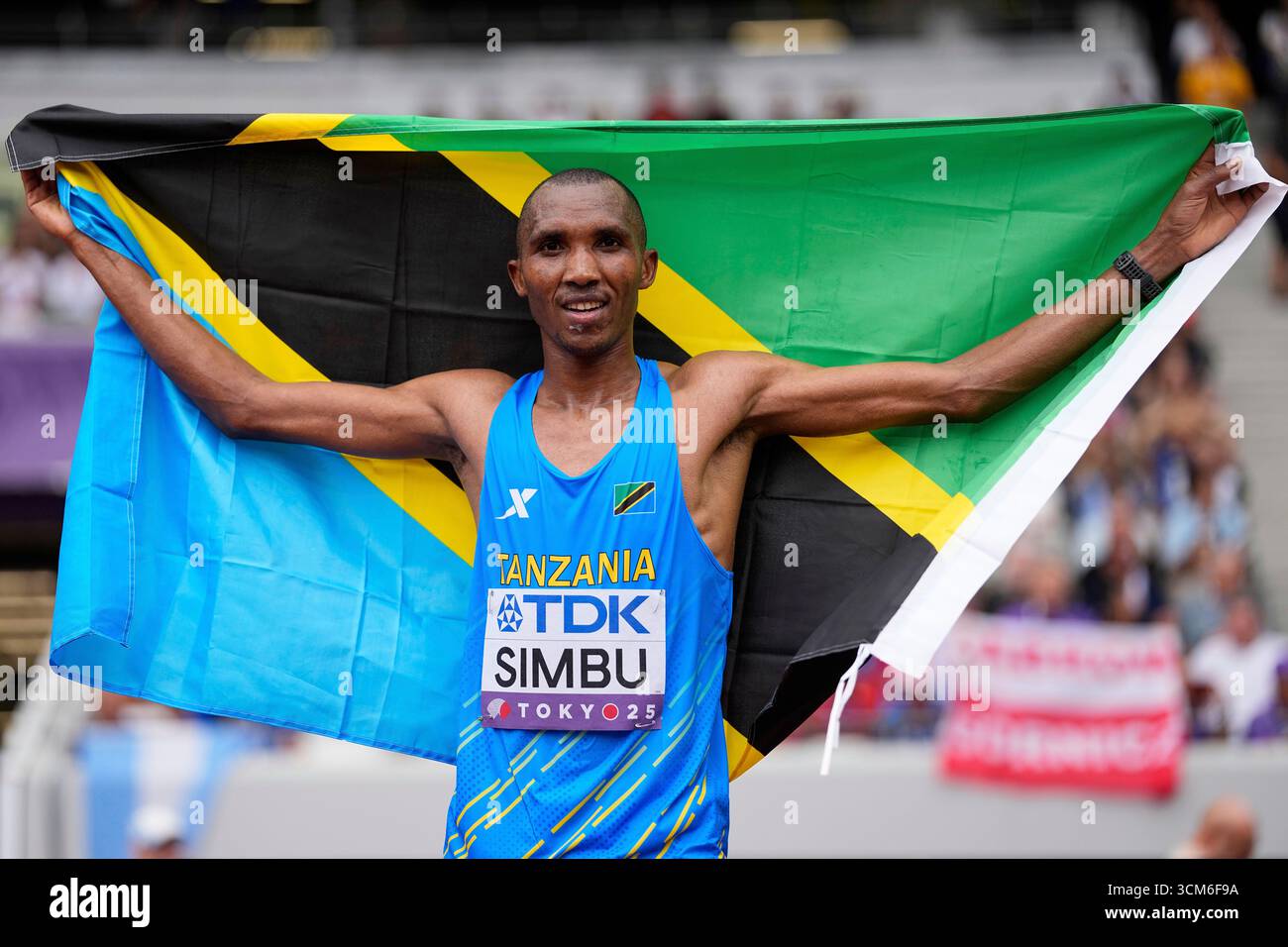 Tanzania's Alphonce Felix Simbu poses after winning the gold medal in ...