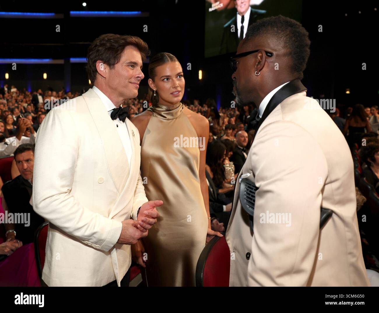 James Marsden, left, and Frederique Brons at the 77th Emmy Awards on
