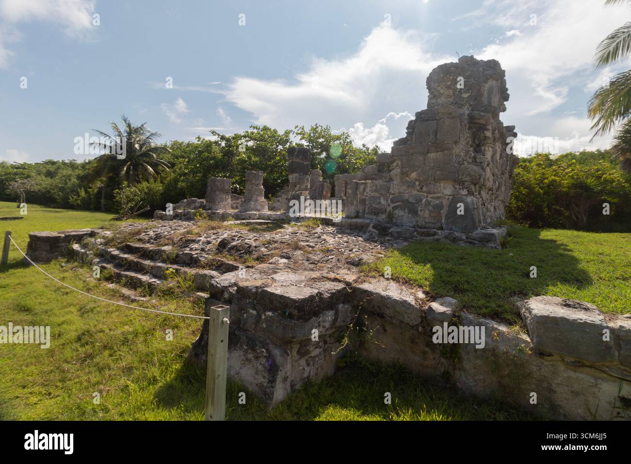 The beautiful mayan ruins of a temple in golden hour into el rey ...