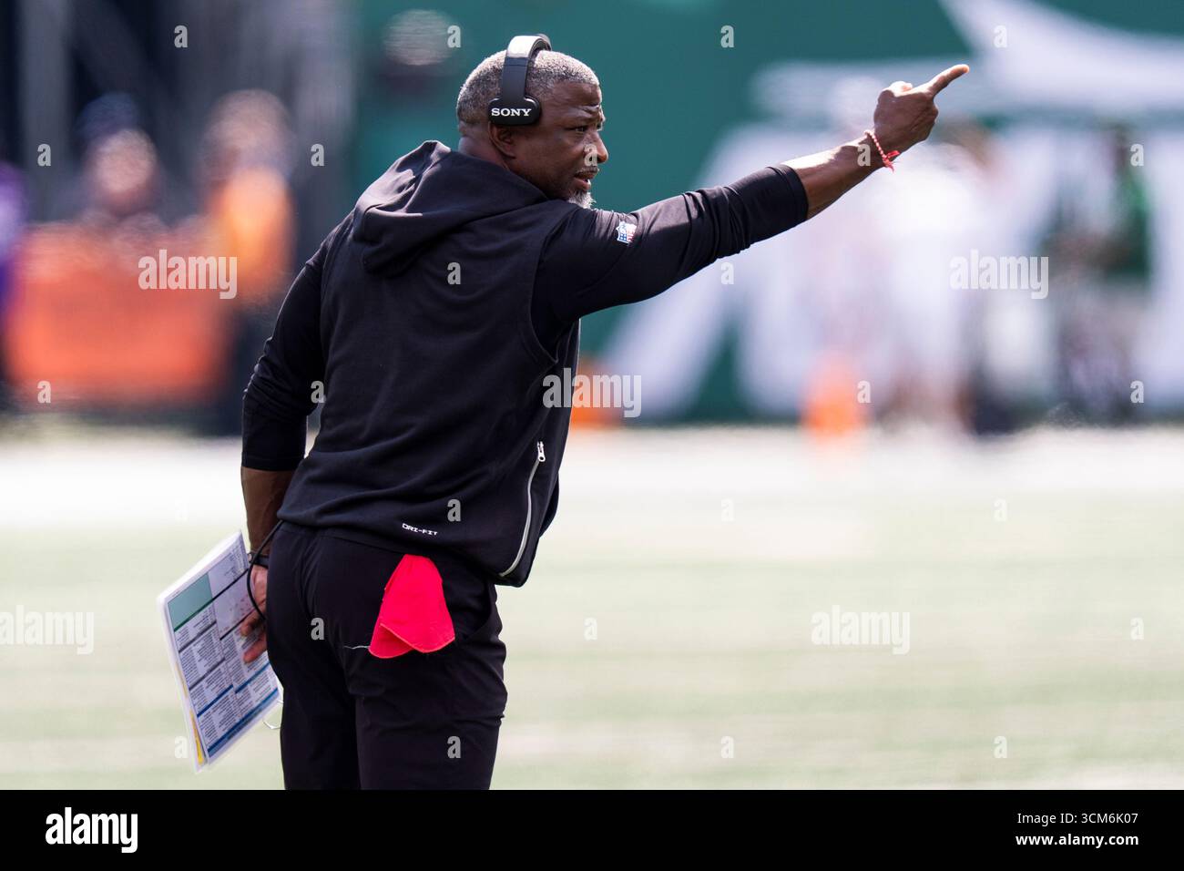 New York Jets head coach Aaron Glenn reacts during an NFL football game ...