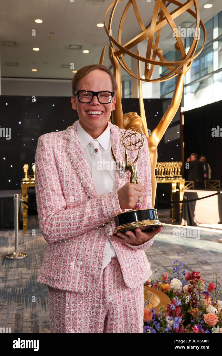 EXCLUSIVE Jeff Hiller picks up their official Emmy statuette at the