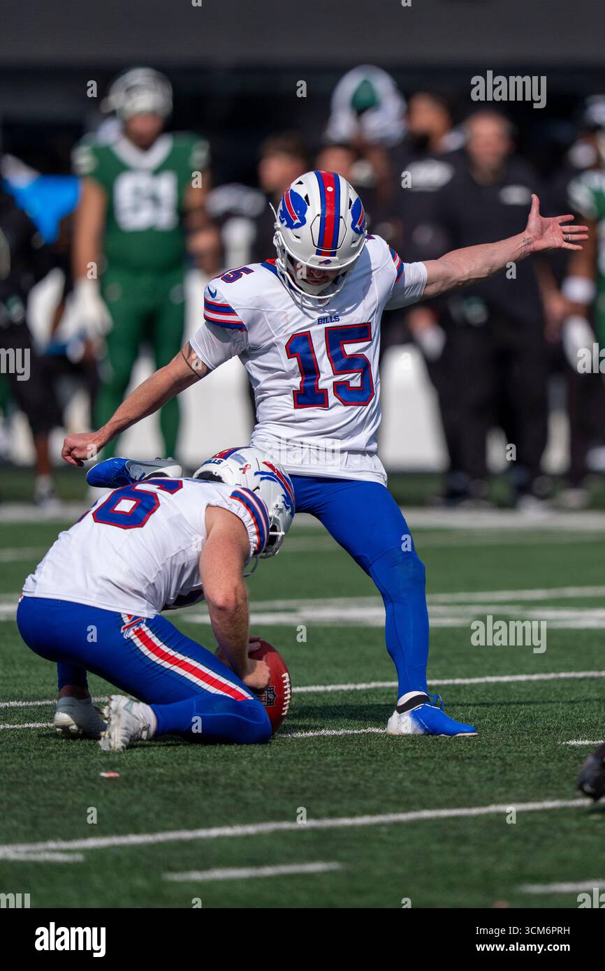 Buffalo Bills kicker Matt Prater (15) kicks the extra point with punter ...