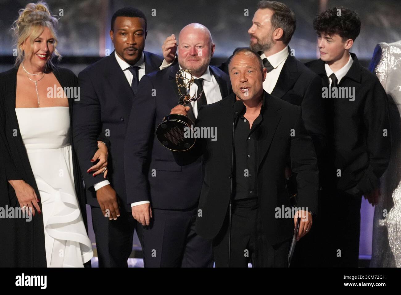 Stephen Graham, center, and the cast and crew of 