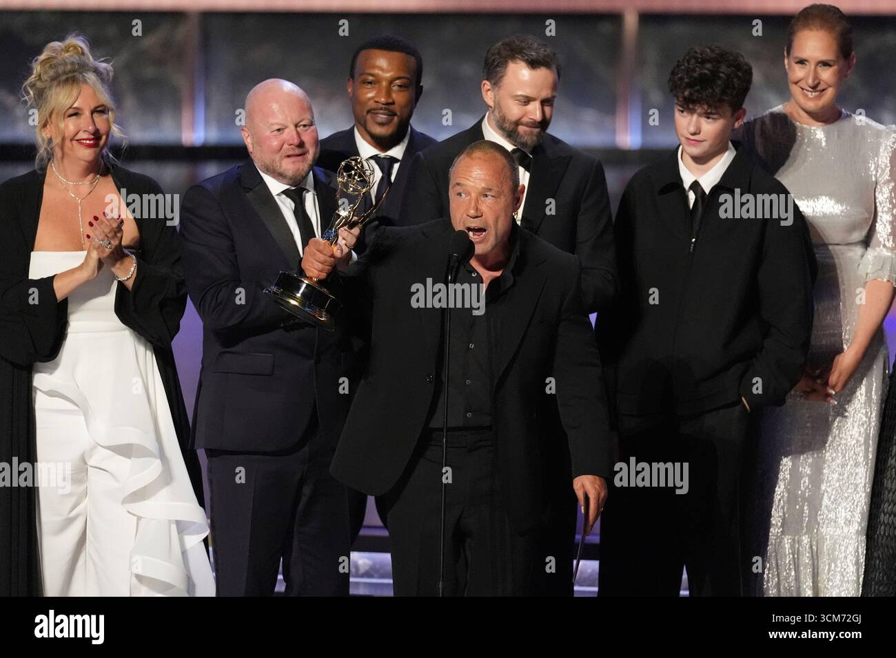Stephen Graham, center, and the cast and crew of 