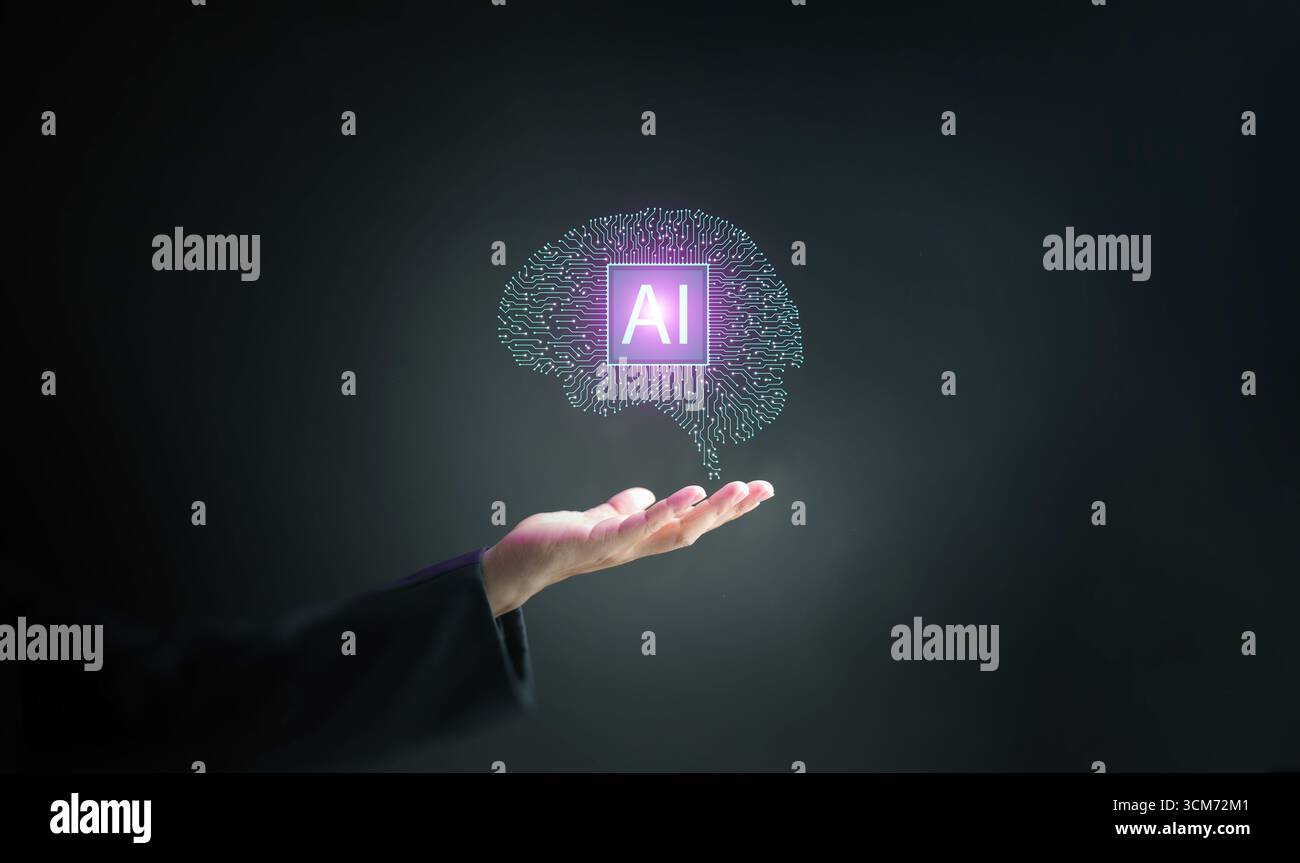 Modern artificial intelligence brain hologram glowing above hand, symbolizing innovation, deep learning, data science, and advanced digital technology Stock Photo