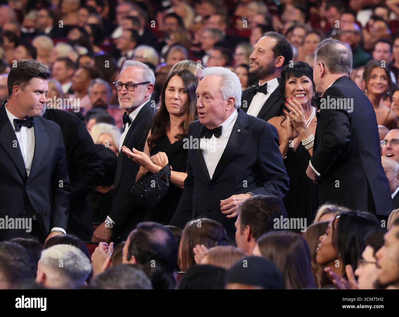 The team from "SNL50 The Anniversary Special " accepts the Emmy for