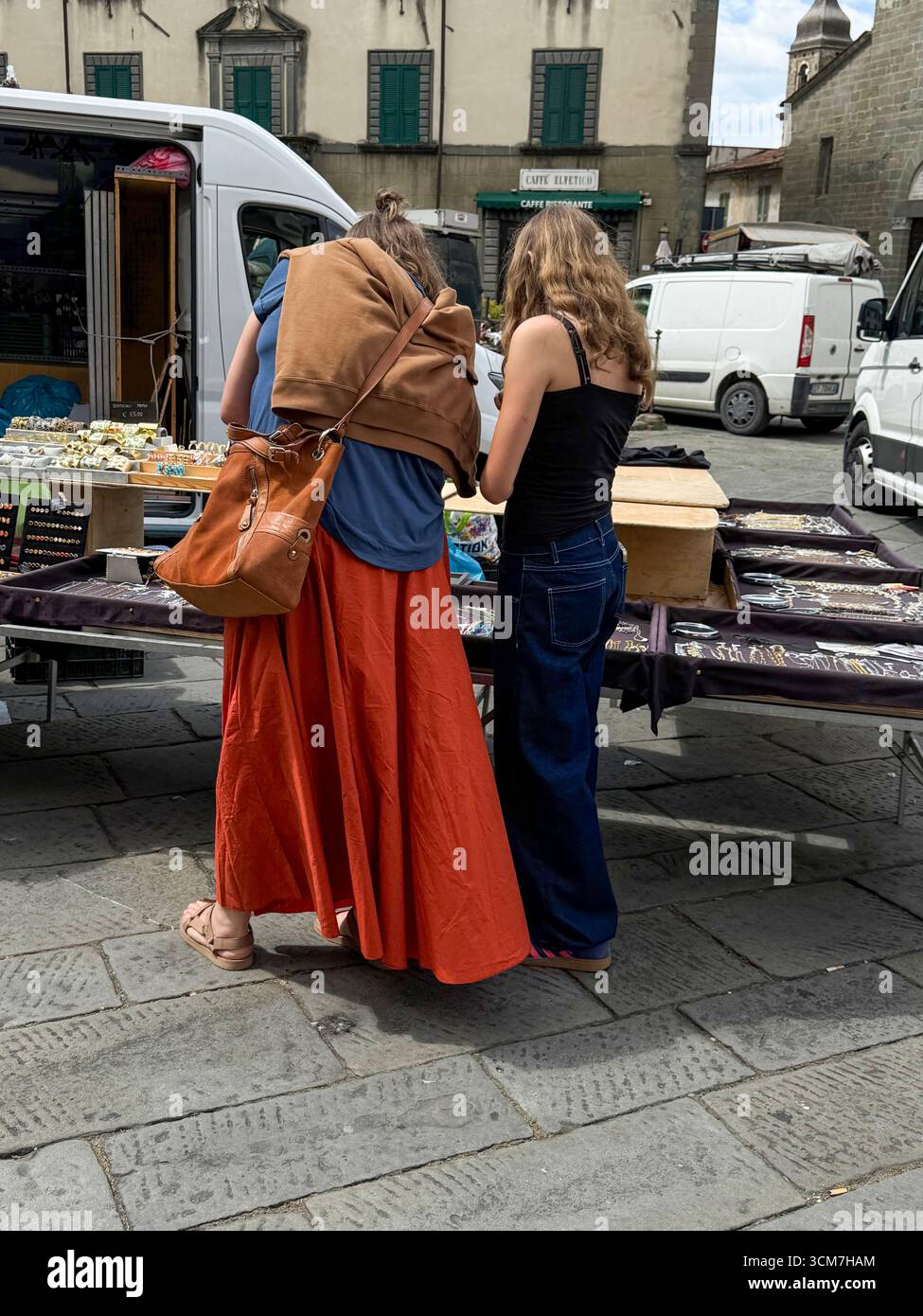A jewellery stall at the weekly market held on the 16th century Piazza Medice) in the medieval town of Fivizzano, a commune in the province of Massa a - Smartphone Captured Stock Image
