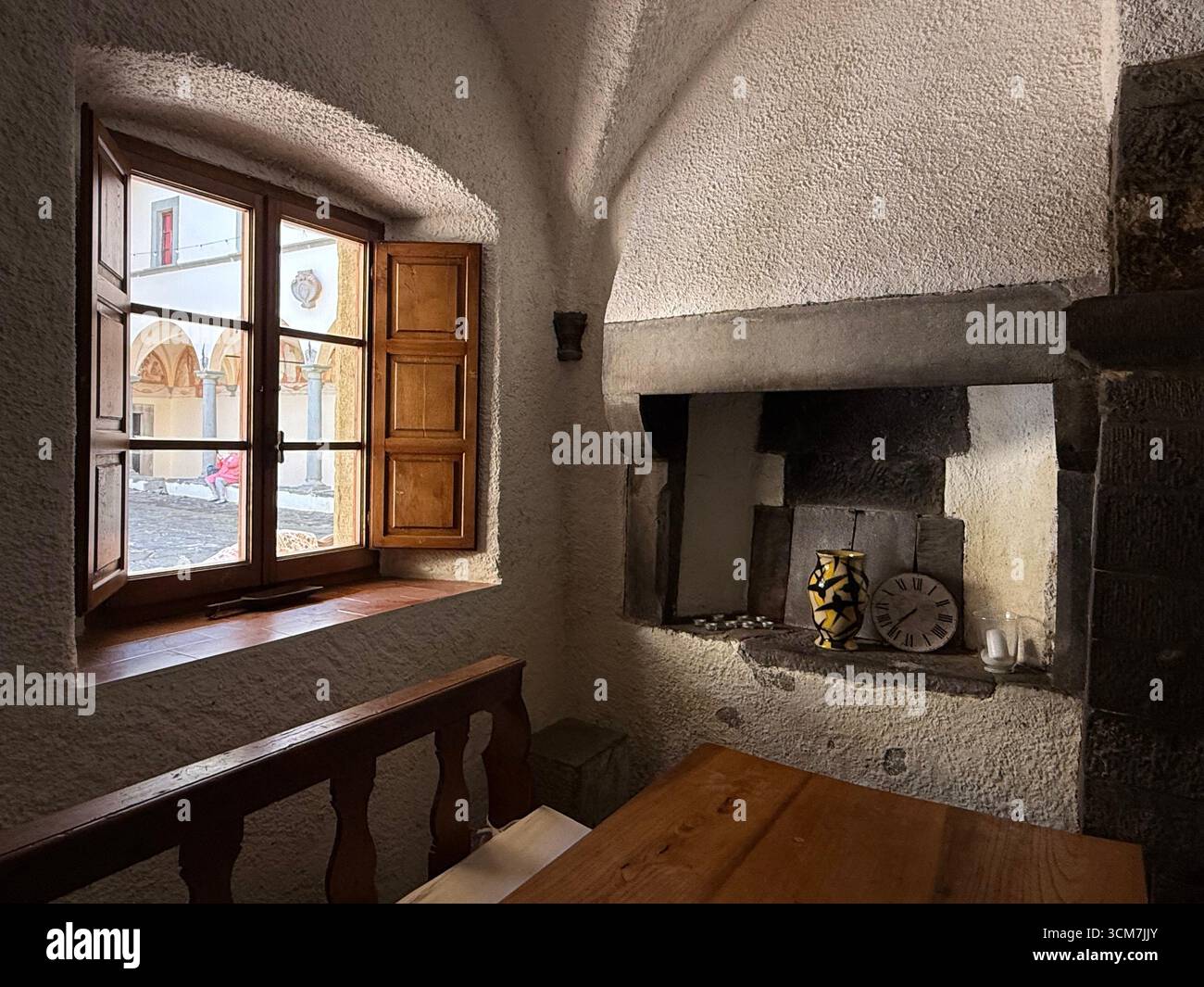 Part of the dining room next to the central courtyard at the !6th century monastery called 11 convento del Carmine is near the small medieval town of - Smartphone Captured Stock Image