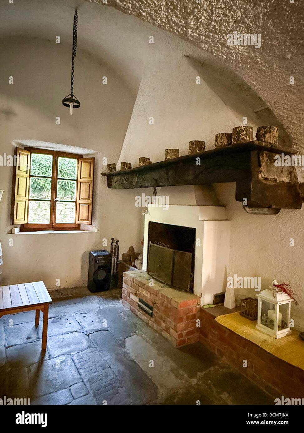 The old oven in the kitchen at the !6th century monastery called 11 convento del Carmine is near the small medieval town of Fivizzano in the commune p - Smartphone Captured Stock Image