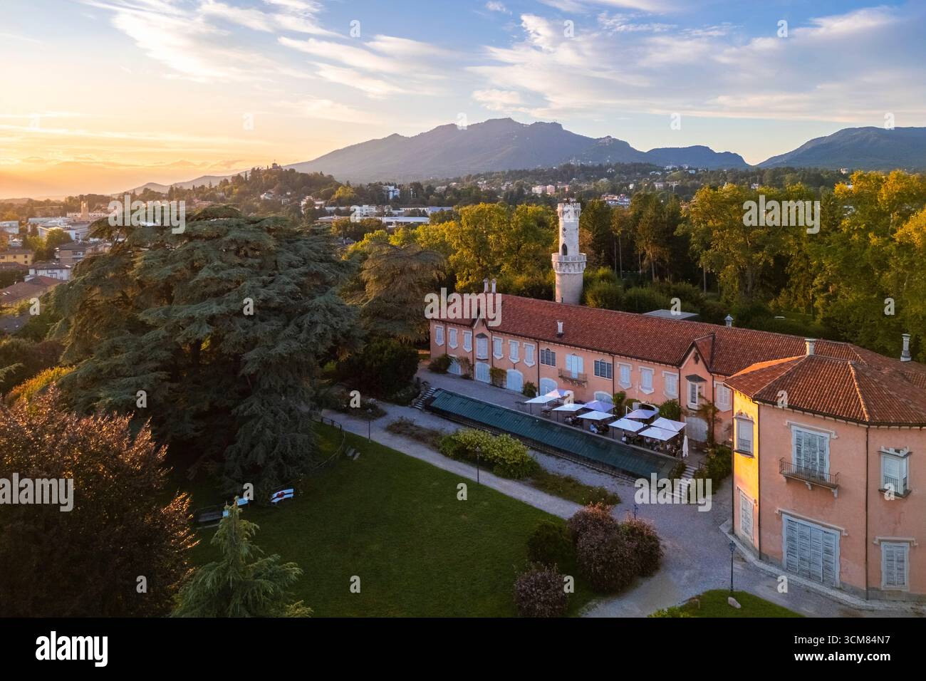 Summer sunset over Villa Mirabello and Giardini Estensi in the city center of Varese. Varese, Lombardy, Italy. Stock Photo