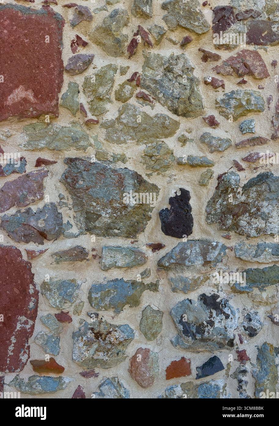 Mortar With Rocks Rustic stone wall with multicolored natural rocks and mortar Stock ...