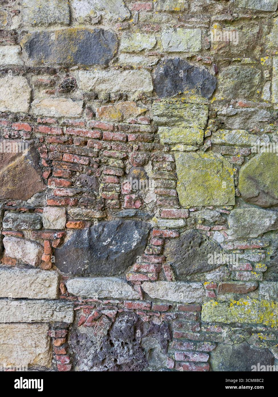 Mortar With Rocks Rustic stone wall with multicolored natural rocks and mortar Stock ...