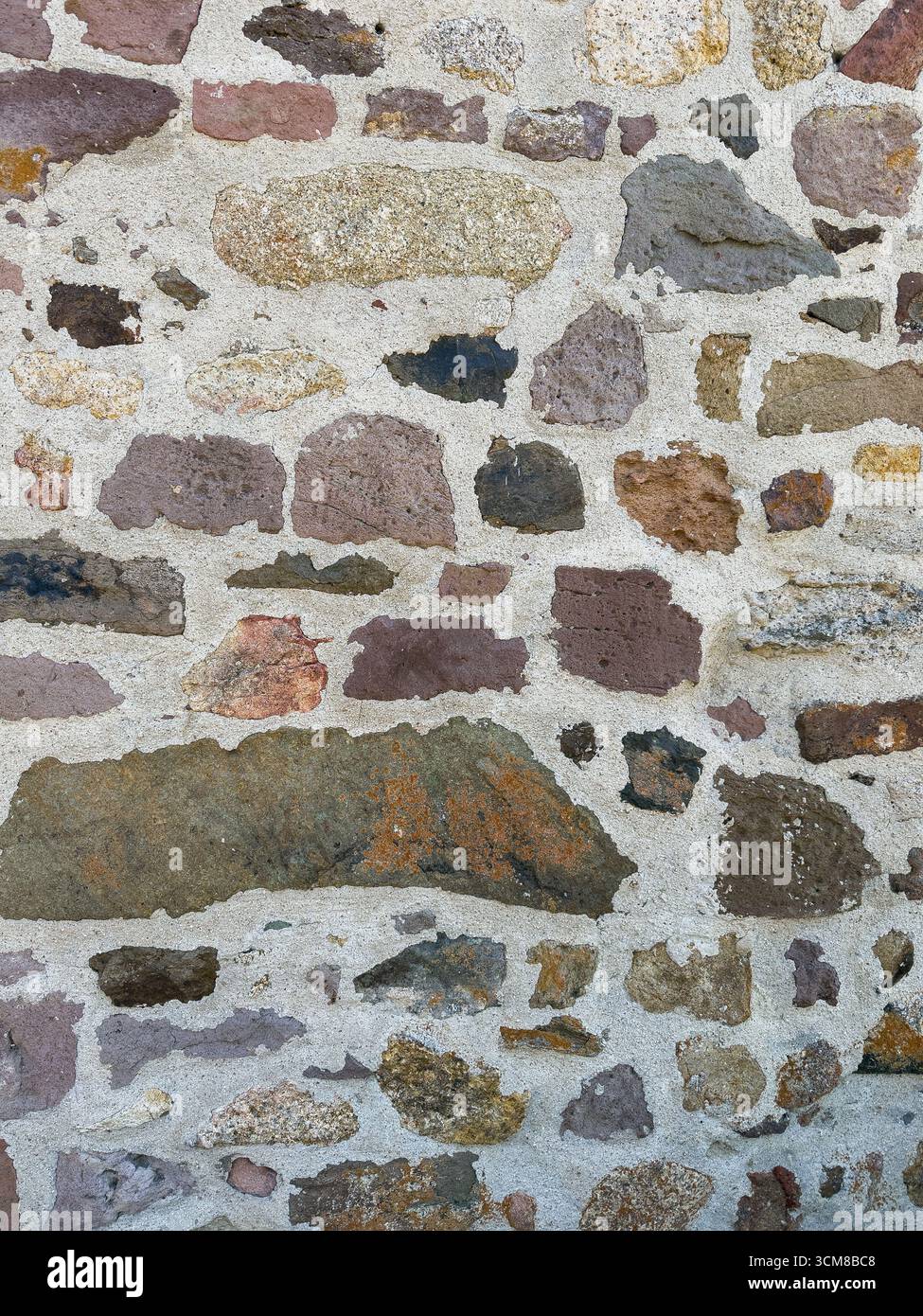 Mortar With Rocks Rustic stone wall with multicolored natural rocks and mortar Stock ...