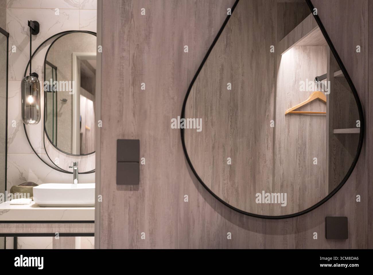 Wardrobe and restroom inside a modern luxury hotel. Stock Photo