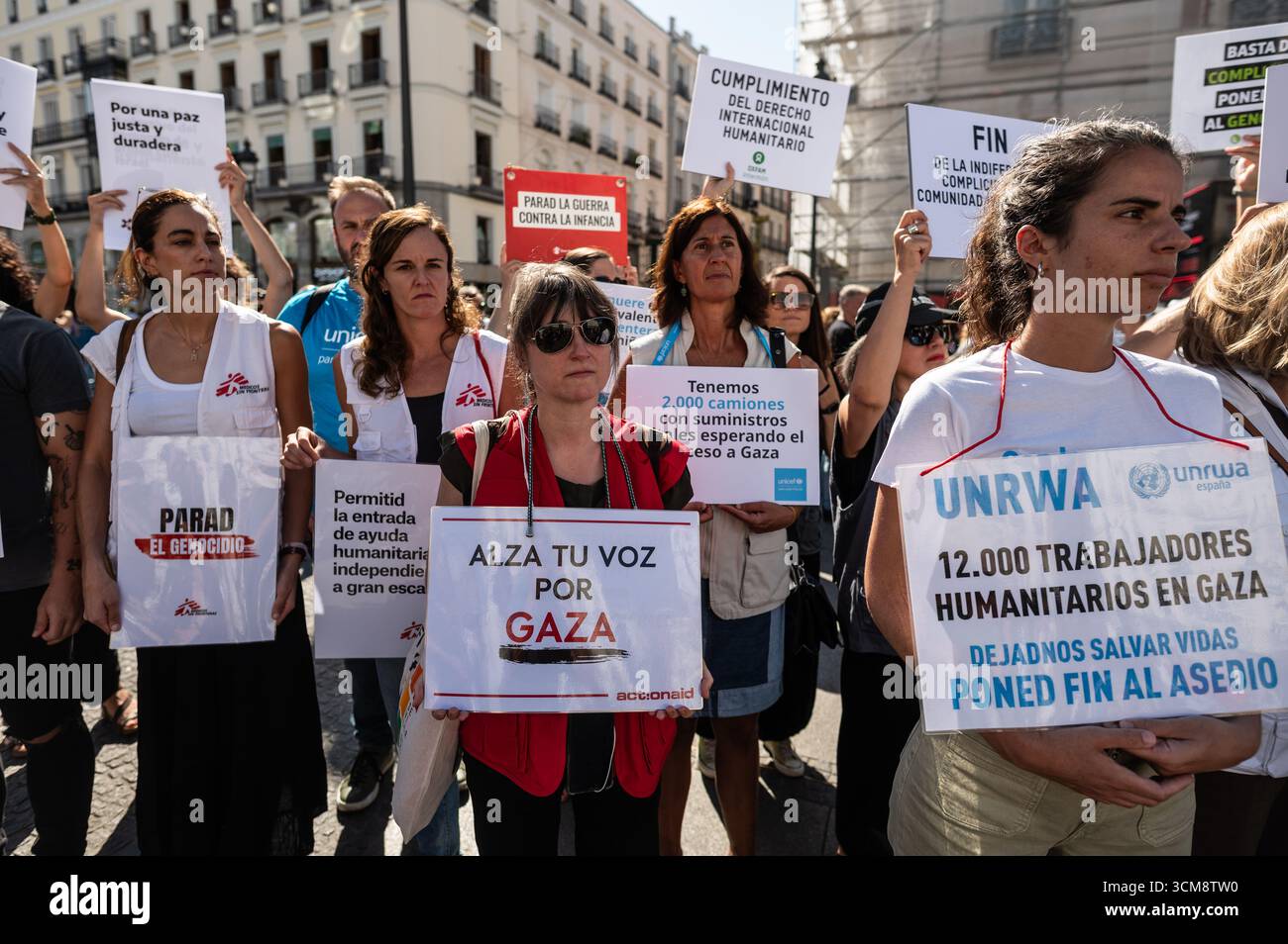 Madrid, Spain. 15th Sep, 2025. A group of activists carrying placards are seen during a protest that the “Artists with Palestine” platform has organized, a 10-hour event at Puerta del Sol in which the names of the Palestine children killed in Gaza during the Israeli attacks are being read. Credit: Marcos del Mazo/Alamy Live News Stock Photo