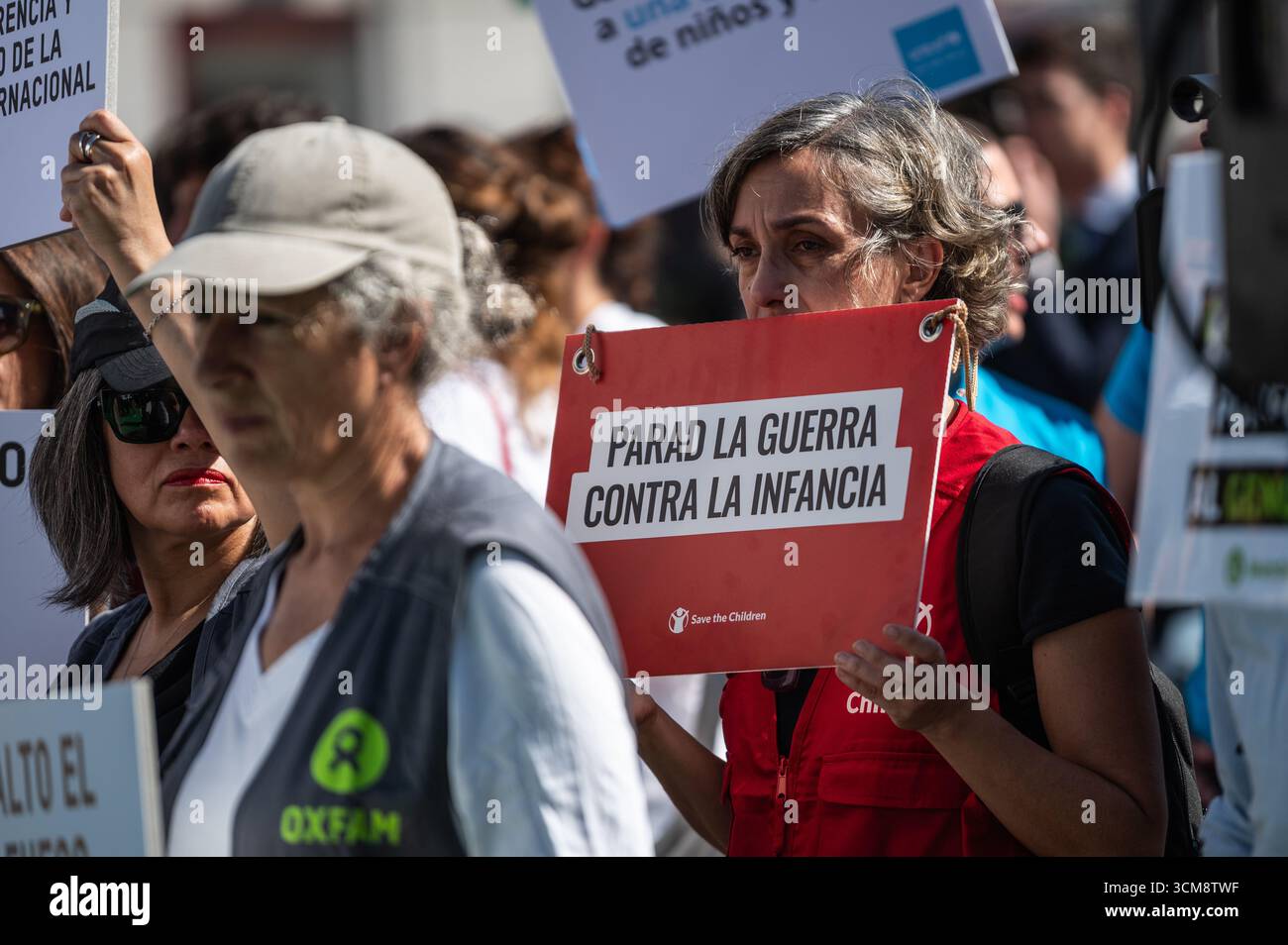Madrid, Spain. 15th Sep, 2025. A group of activists carrying placards are seen during a protest that the “Artists with Palestine” platform has organized, a 10-hour event at Puerta del Sol in which the names of the Palestine children killed in Gaza during the Israeli attacks are being read. Credit: Marcos del Mazo/Alamy Live News Stock Photo
