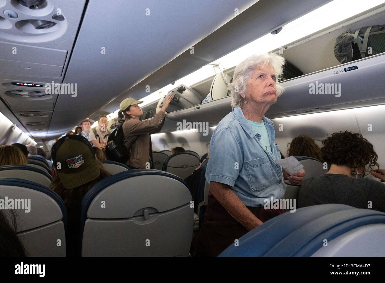 Airplane passengers unhappy hi-res stock photography and images - Alamy