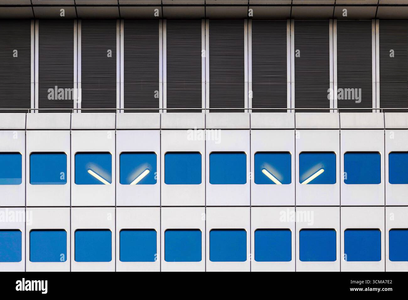 Germany, Frankfurt, Silver Tower, Neon tubes in the windows create a ...