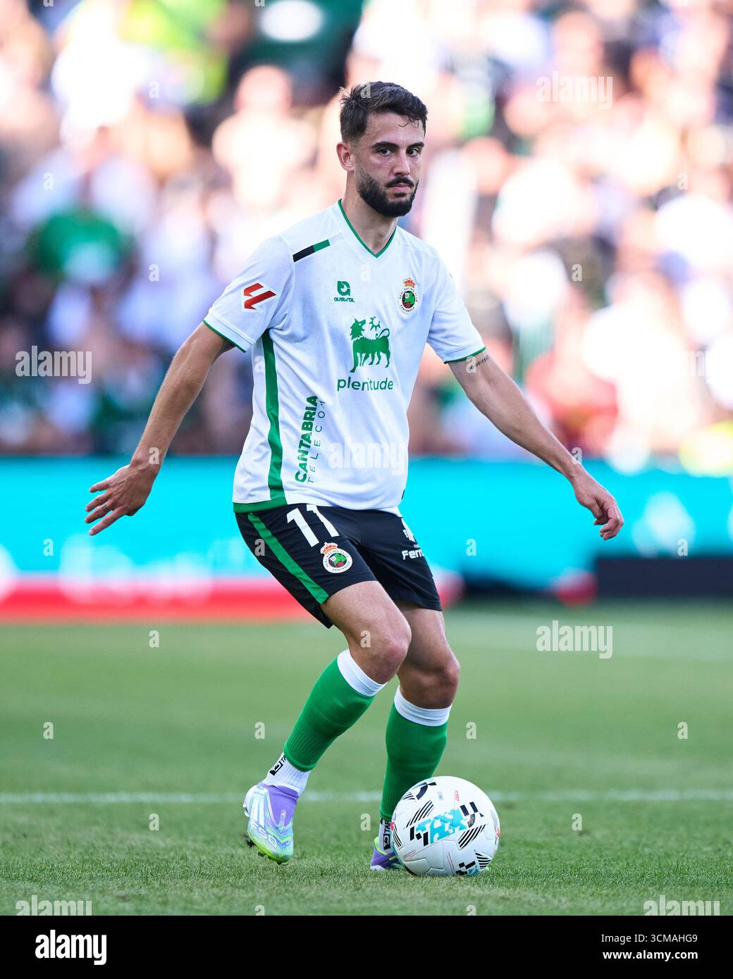 Andres Martin of Real Racing Club with the ball during the LaLiga Hypermotion match between Real Racing Club and Cultural y Deportiva Leonesa at Campo Stock Photo