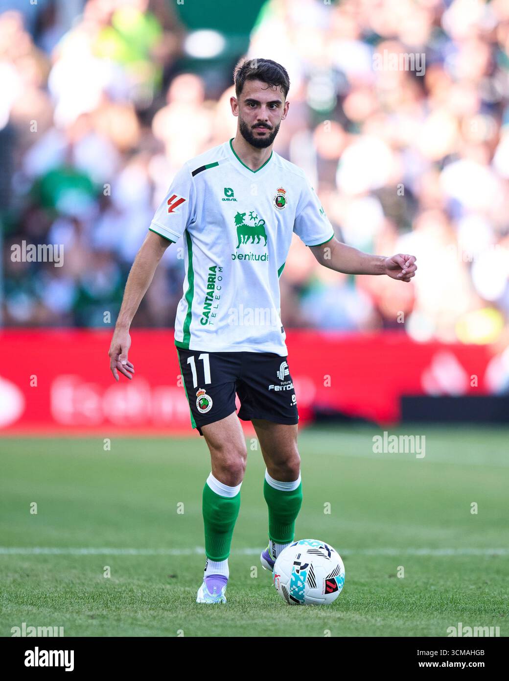 Andres Martin of Real Racing Club with the ball during the LaLiga Hypermotion match between Real Racing Club and Cultural y Deportiva Leonesa at Campo Stock Photo