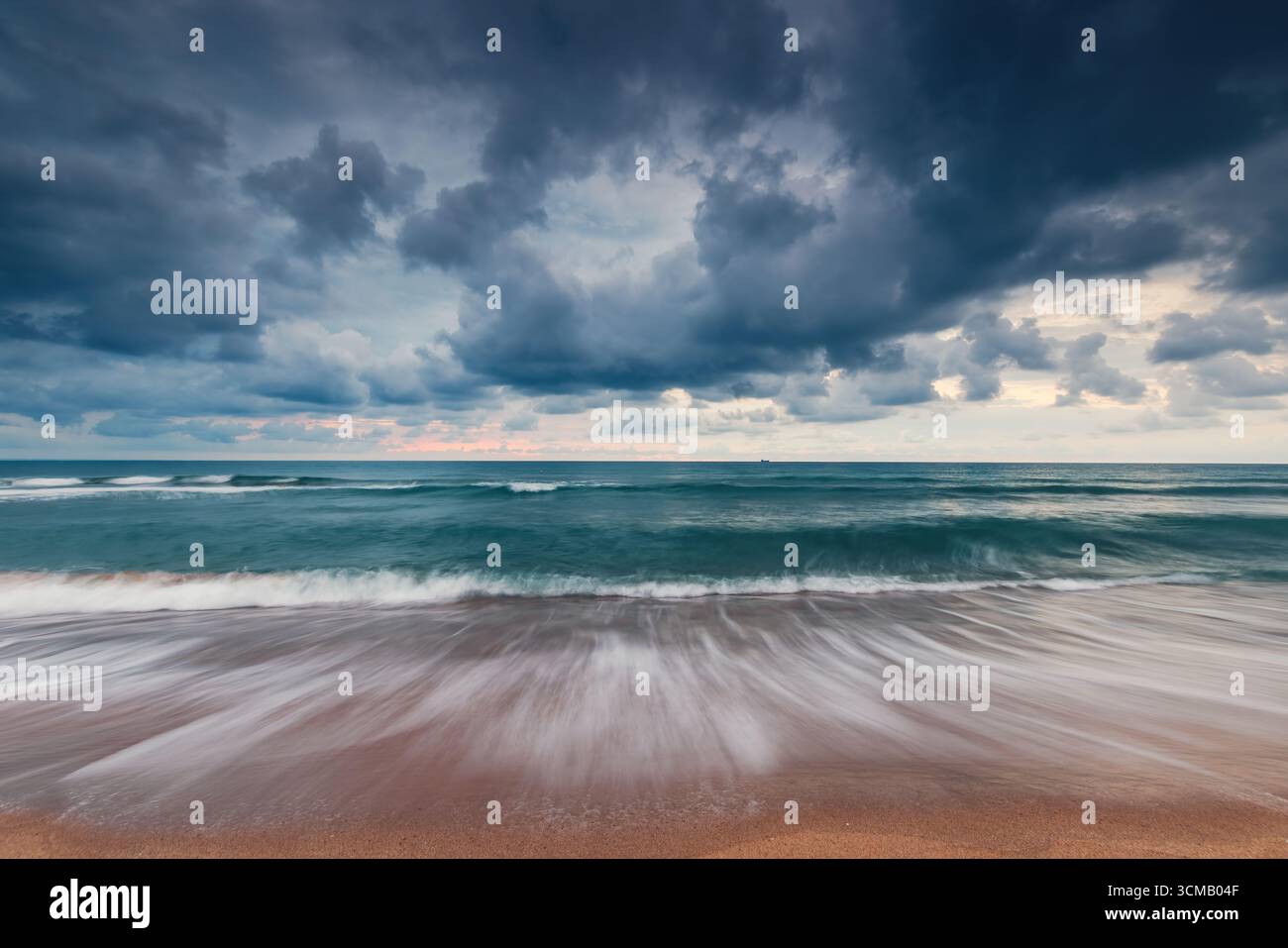 Dramatic Ocean Seascape with Waves Under a Stormy Cloudy Sky Stock Photo