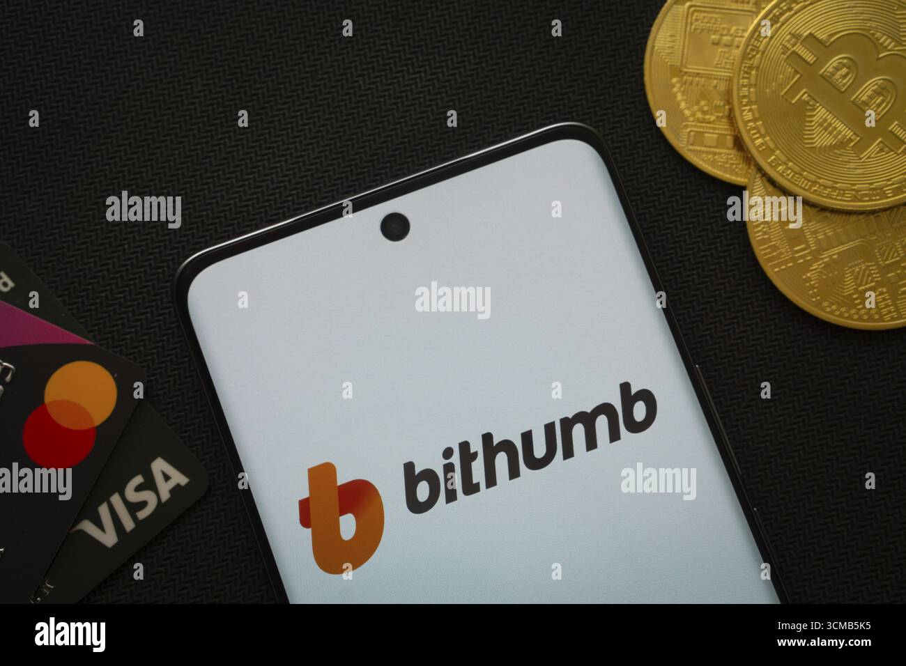 Dhaka, Bangladesh- 07 May 2025: Smartphone displaying Bithumb logo ...