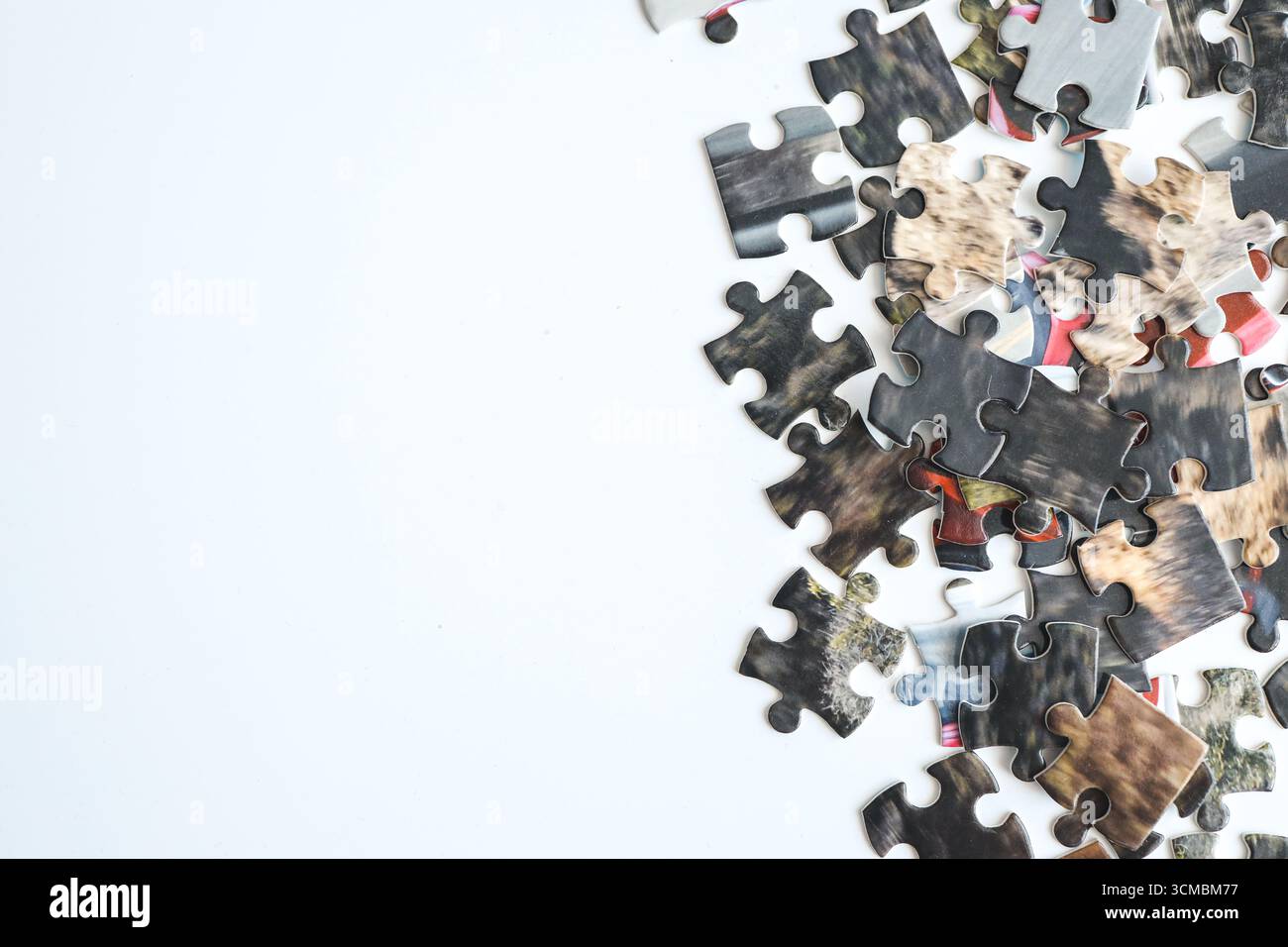 Puzzles on a white background, space for text. Stock Photo
