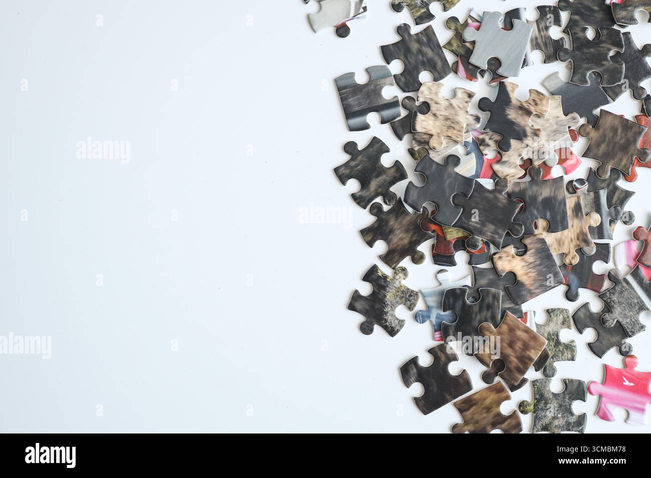 Puzzles on a white background, space for text. Stock Photo