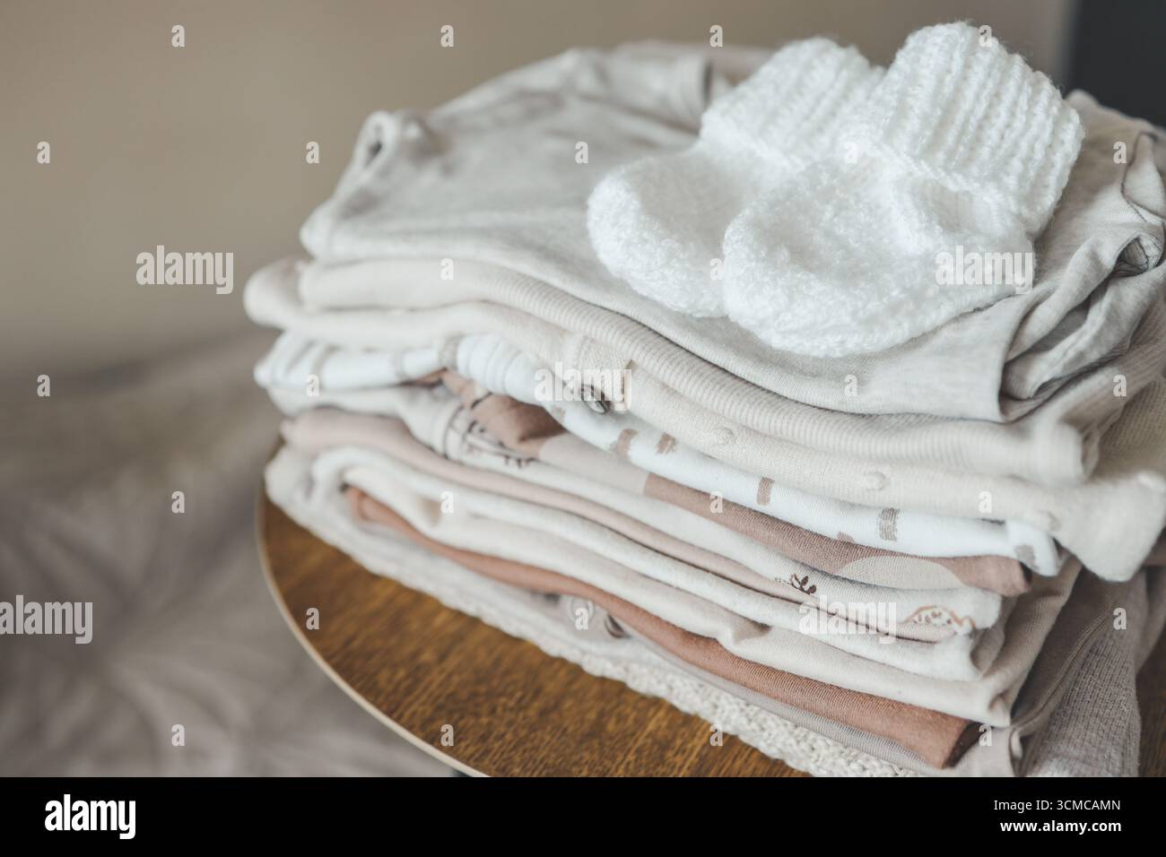 Knitted baby girl bodysuit hi-res stock photography and images - Alamy