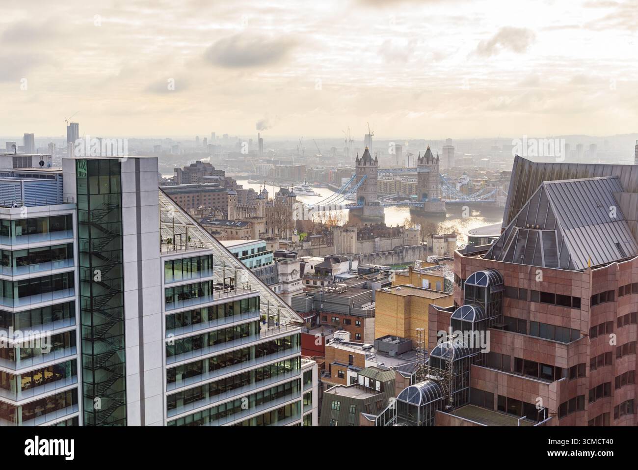 Elevated view of Tower Bridge and Tower of London on a misty winter ...