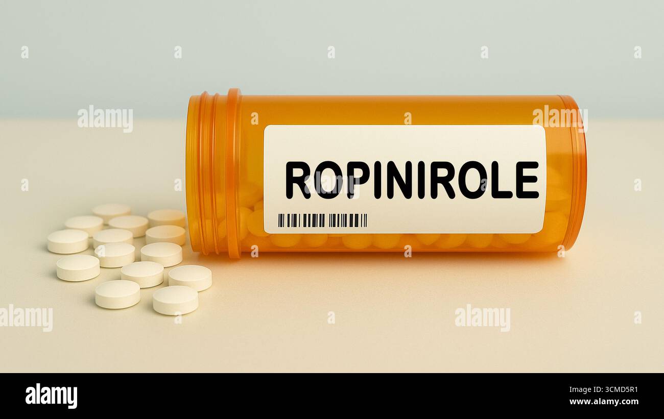Box of ROPINIROLE tablets on a hospital pharmacy table used to treat Parkinson disease and restless legs a dopamine agonist. Stock Photo