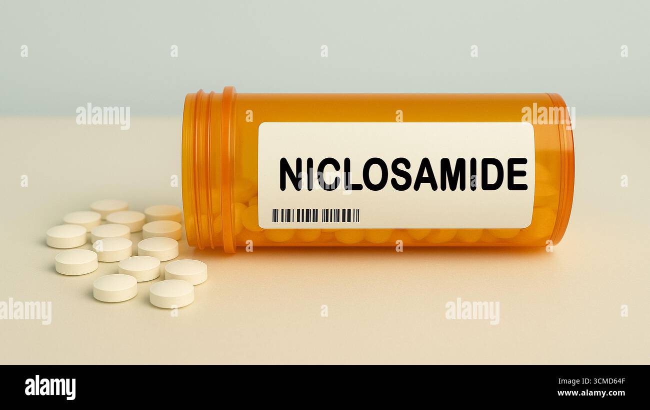 Box of NICLOSAMIDE tablets on a hospital pharmacy table used to treat tapeworm infections an anthelmintic. Stock Photo
