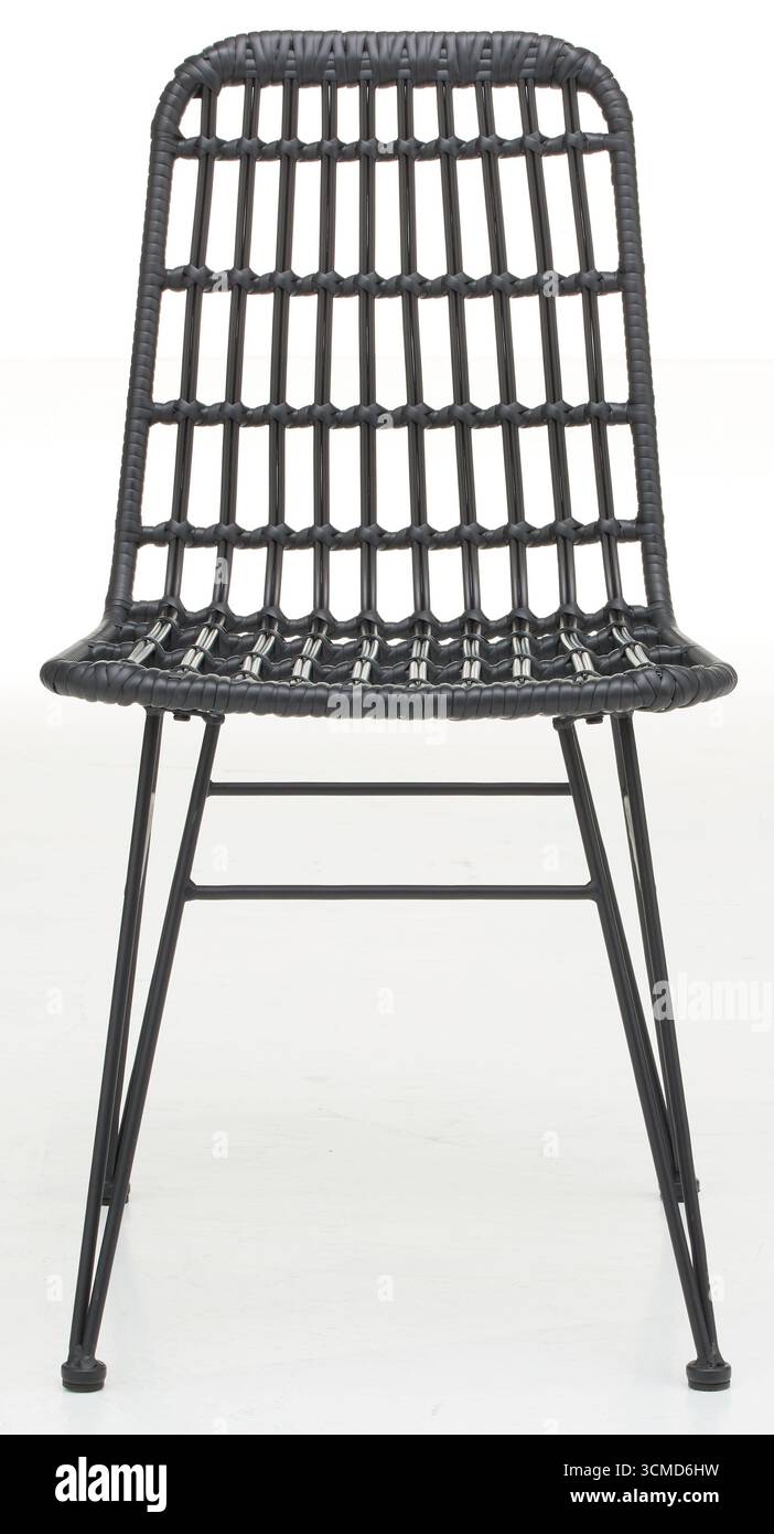 Plastic covered steel frame chair, front view isolated nature background with clipping path Stock Photo