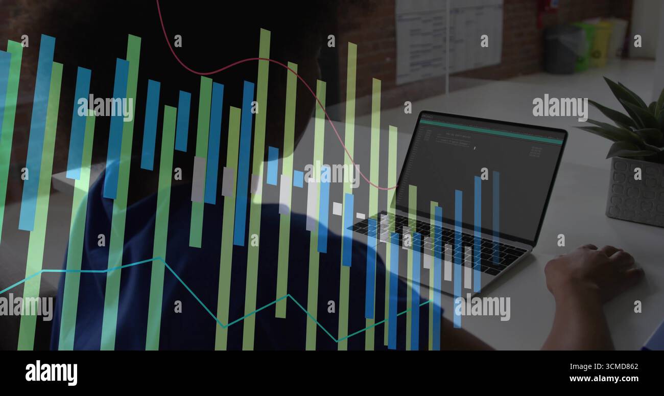 Coding female developer analyzing metrics on laptop at office desk, with data visualization overlay Stock Photo