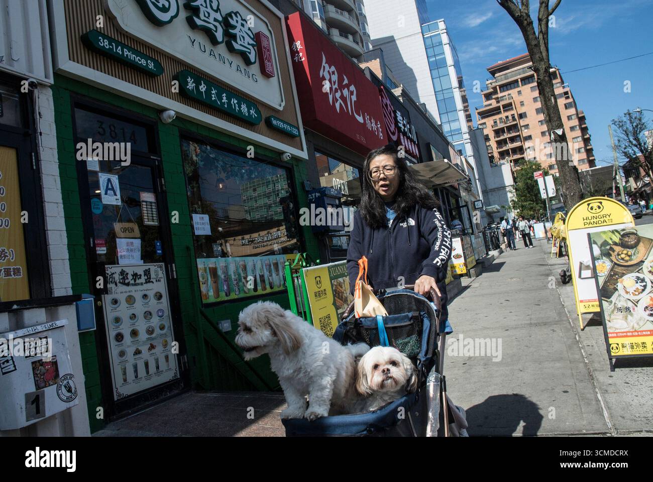 September 15, 2025, New York City, New York, USA: A Day In The Life: ChinaTown Flushing, Queens, New York.The original Queens Chinatown emerged in Flushing, initially as a satellite of the original Manhattan Chinatown, before evolving its own identity, surpassing in scale the original Manhattan Chinatown. Flushing Chinatown, or Mandarin Town Flushing in Flushing, is one of the largest and fastest-growing ethnic Chinese enclaves outside Asia, as well as within New York City itself. Flushing Chinatown is in Main Street and the area to its west, particularly along Roosevelt Avenue, has become the Stock Photo