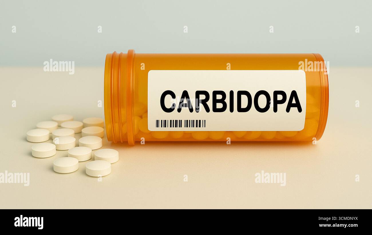 Box of CARBIDOPA tablets on a hospital pharmacy table used with levodopa to treat Parkinson disease a decarboxylase inhibitor. Stock Photo