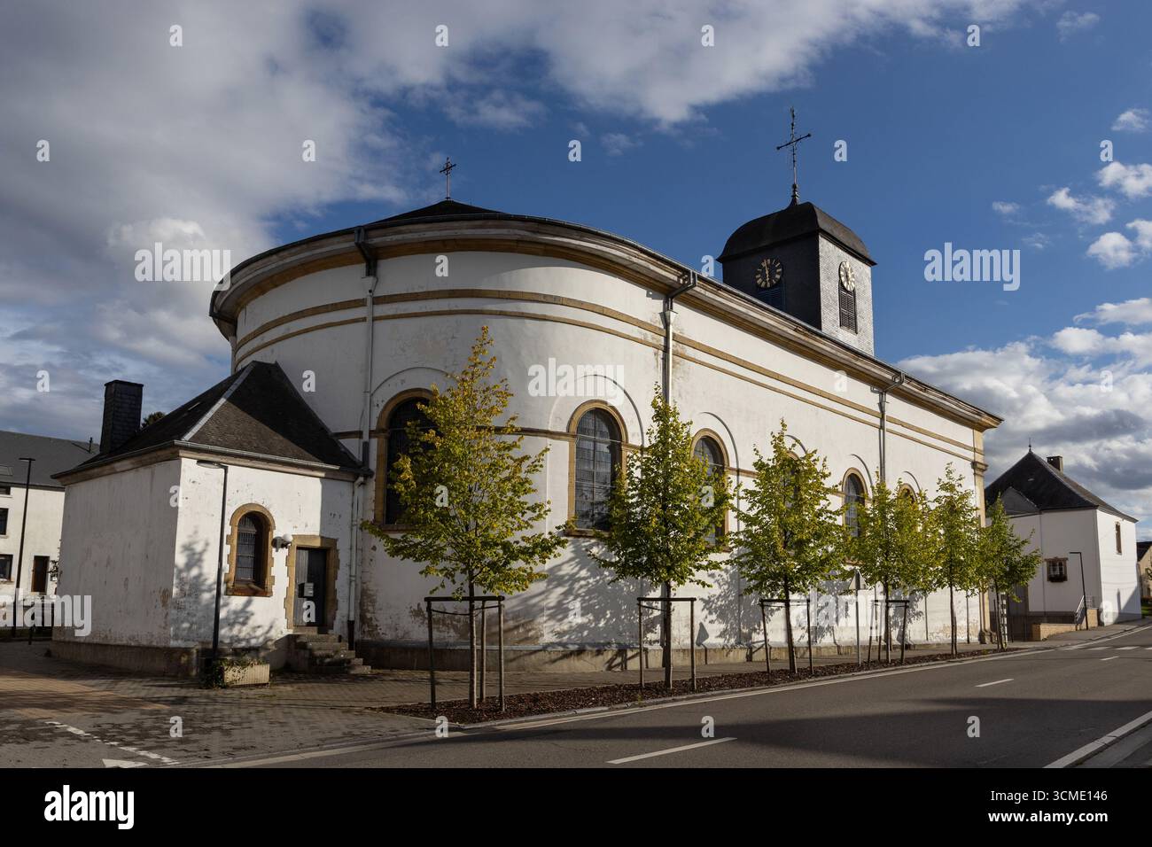 Exterior view of the 19th century Catholic church of Sainte-Walburge in Chiny, Luxembourg Province in Belgium. - Stock Image