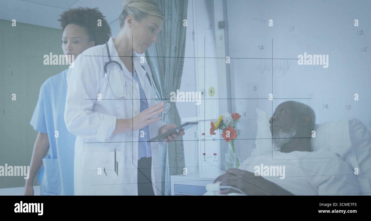 Female doctor reviewing patient data in hospital room, with tablet ...