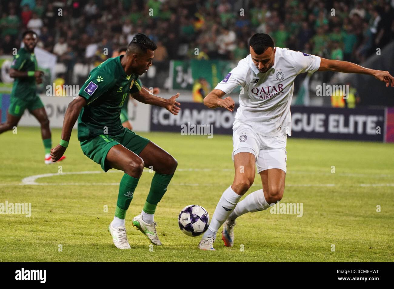 Al Shorta Iraqi forward Bassam Shakir Ahmed (L) seen in action with Al ...